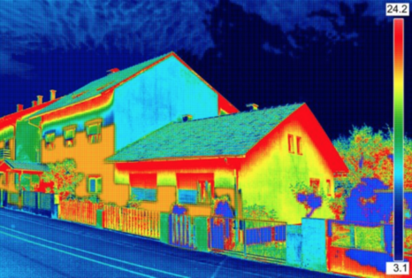 Thermal camera image of house showing the different colours the heat and the cold project